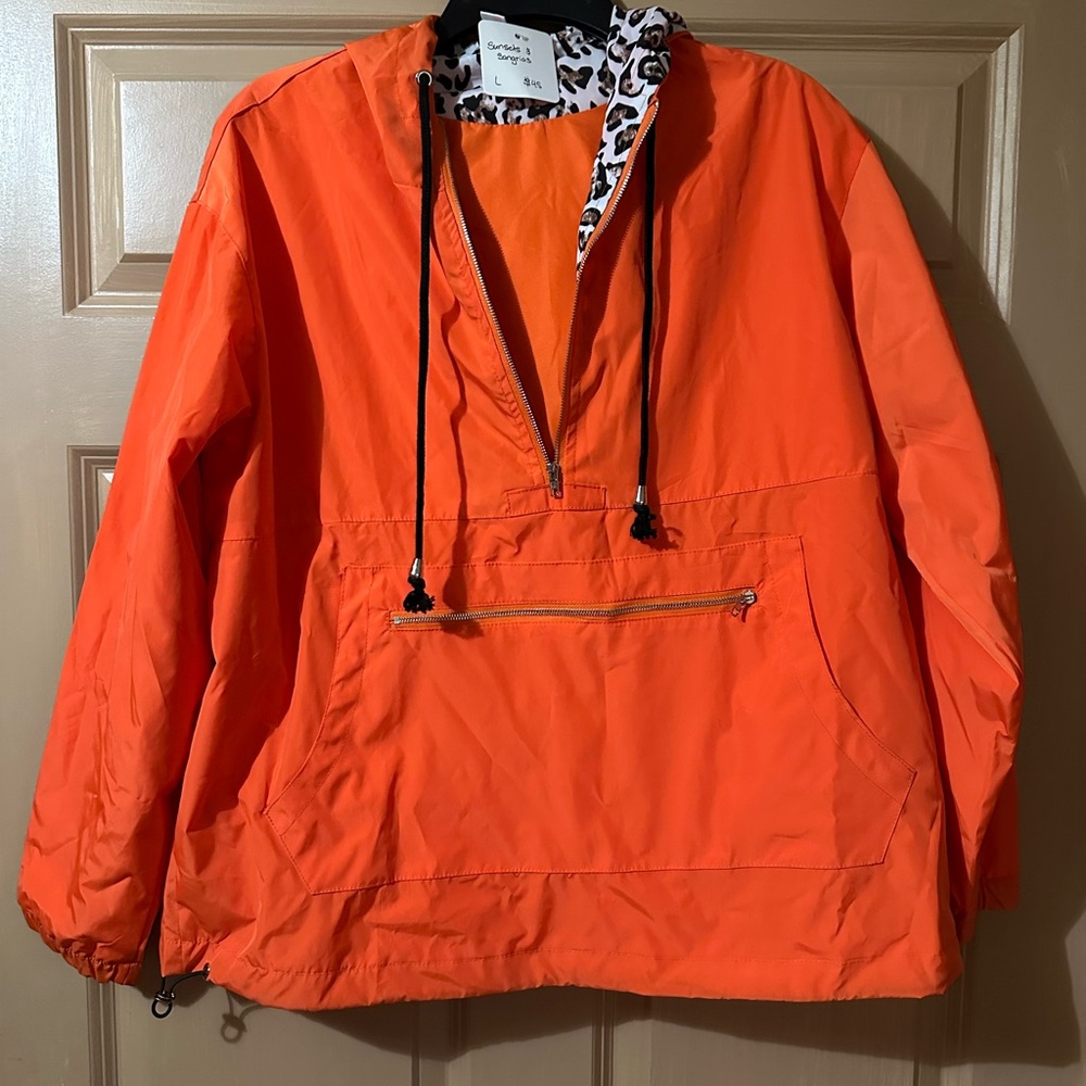 Bright Orange Windbreaker with Leopard Print Hood